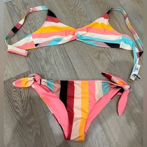 Solid and Striped swimsuit size medium.